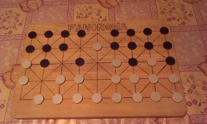 The white piece then moves forward to take the black piece in front of it