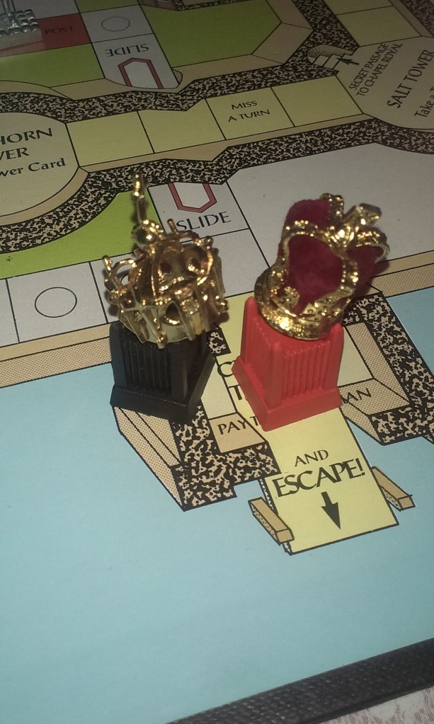 The pieces wearing the Crowns; which is actually the biggest design flaw in the game is they don't fit on top of them, which is upsetting, but additionally I don't think they are supposed to.