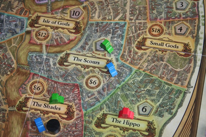 Now the red Minion has been moved to The Hippo, and so the Trouble Marker has been removed. Because red is the only player in The Hippo, no Trouble Marker is placed there.