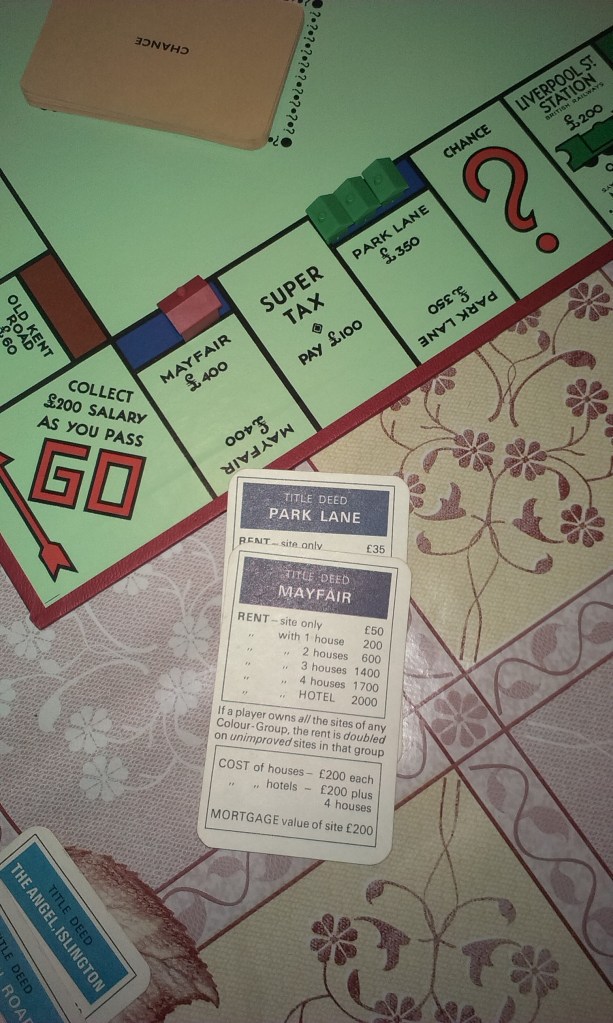 Mayfair has a Hotel, Park Lane has three houses. The long and the short of it is that I'm screwed.