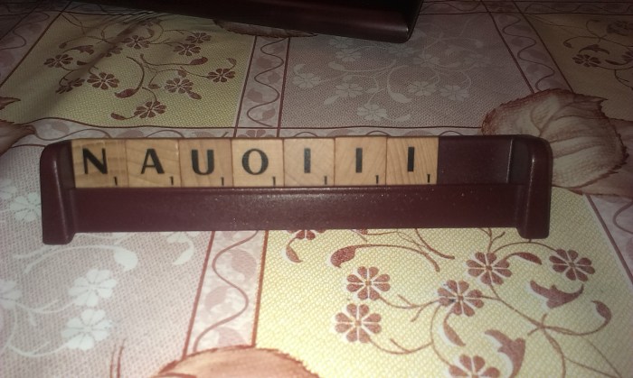 Had I chosen to do so, that rule would've allowed me to replace these tiles with new ones from the Draw Bag